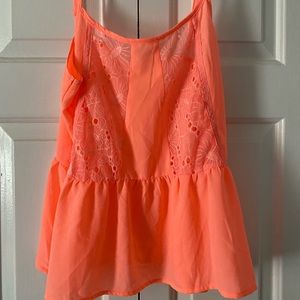 Double zero tank top with adjustable straps, size Medium,and floral design.